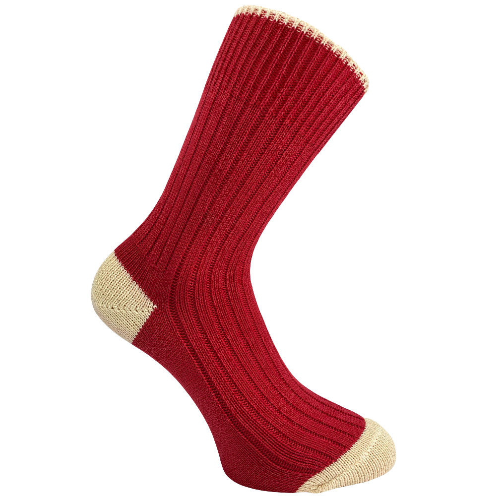 Red sock with cream heel and toe on a white background